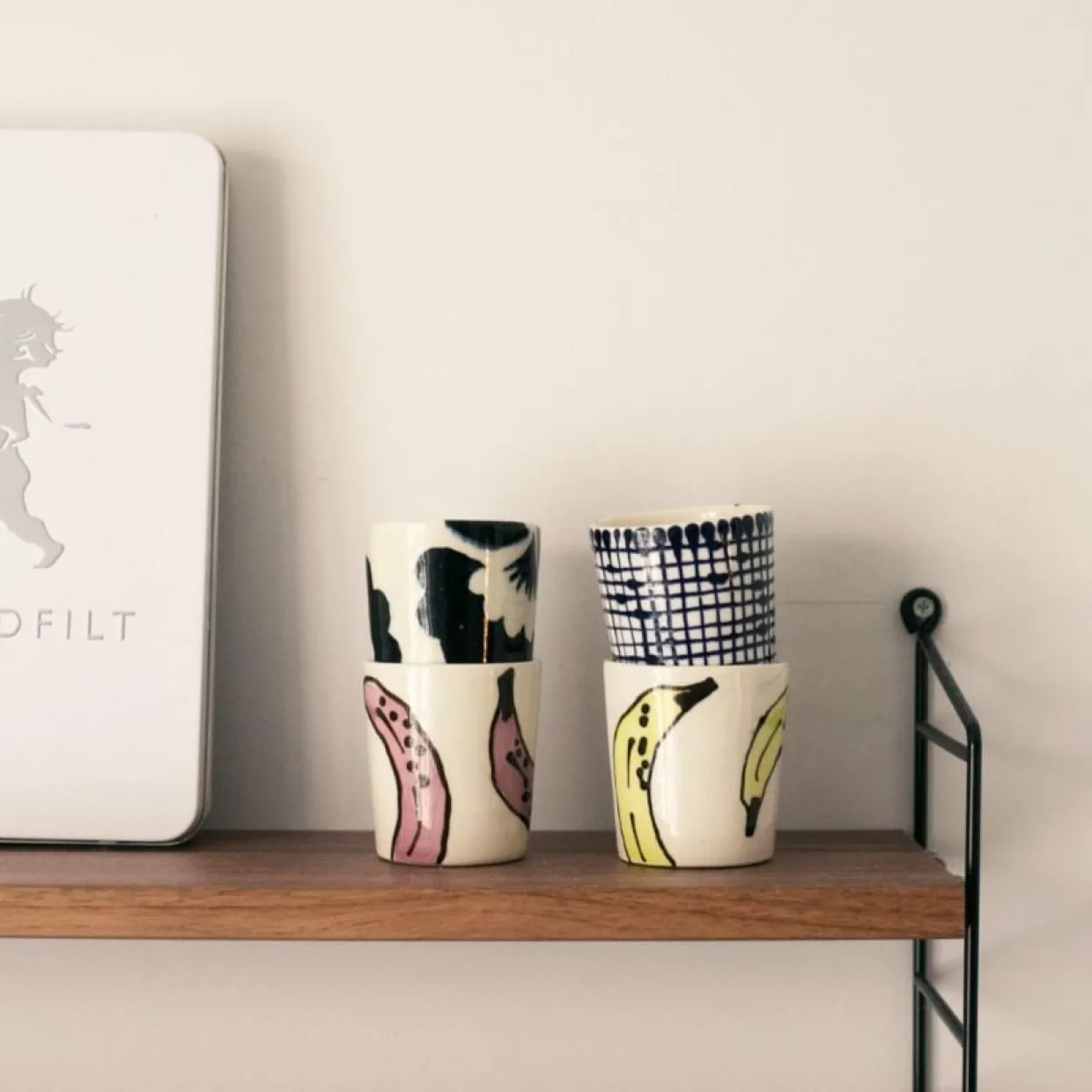 Kopp liten halvblomma svart/vit