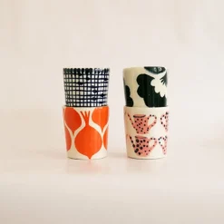 Kopp liten rutig blå