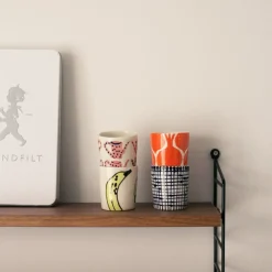 Kopp liten rutig blå