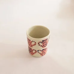 Kopp liten vattenkanna rosa